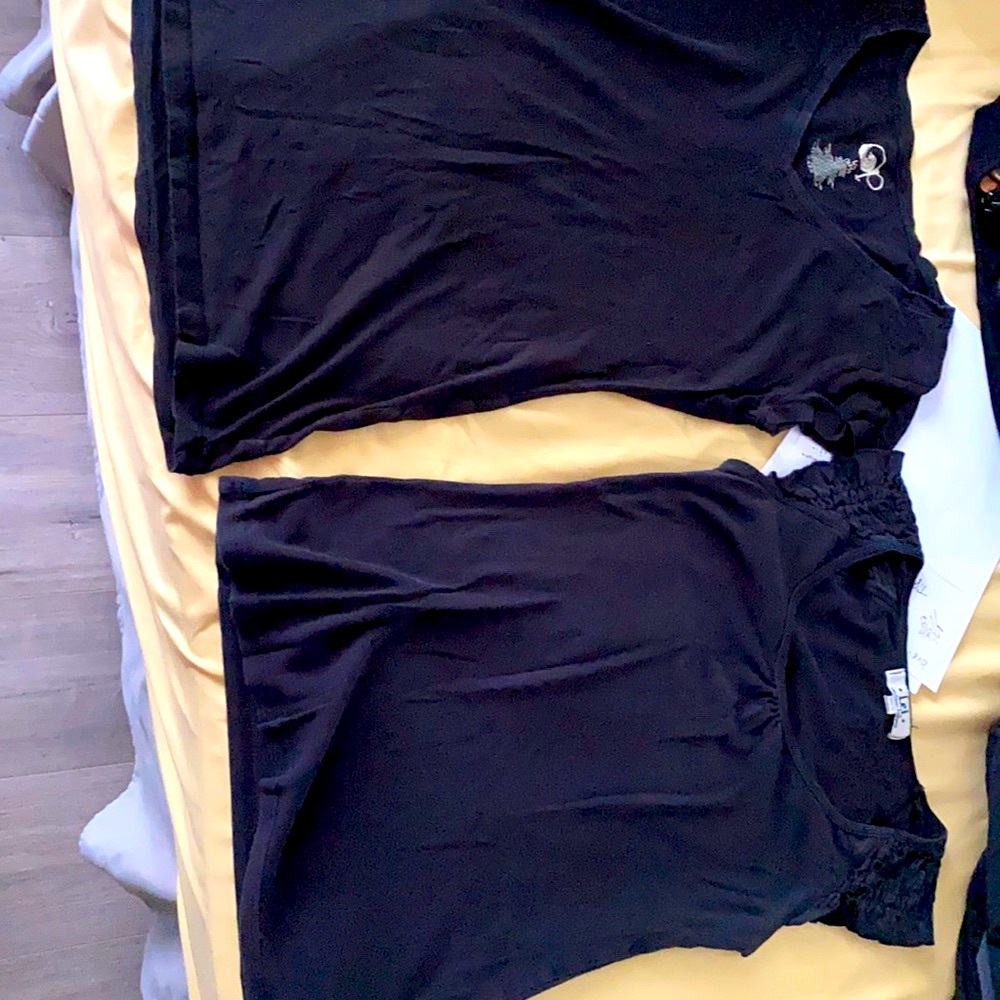 Two tight black shirts